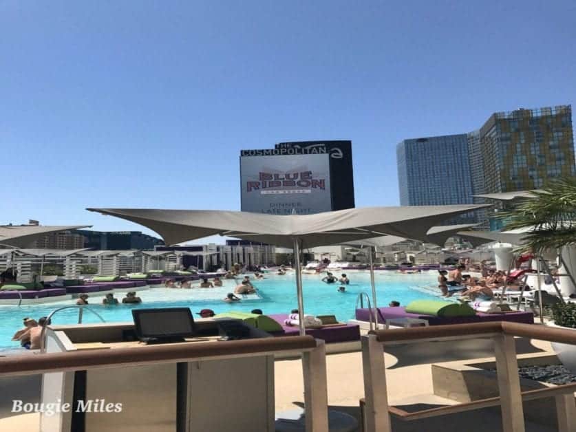 a pool with people swimming in it