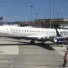 a jet plane on the tarmac