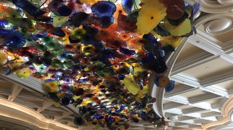 a ceiling with colorful glass flowers