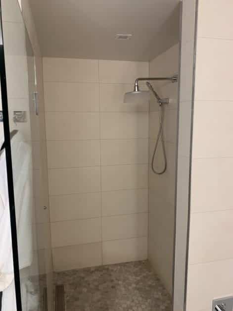 a shower with a shower head