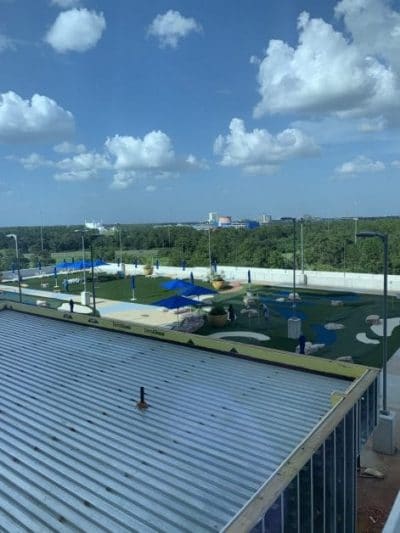 a view of a park from a roof