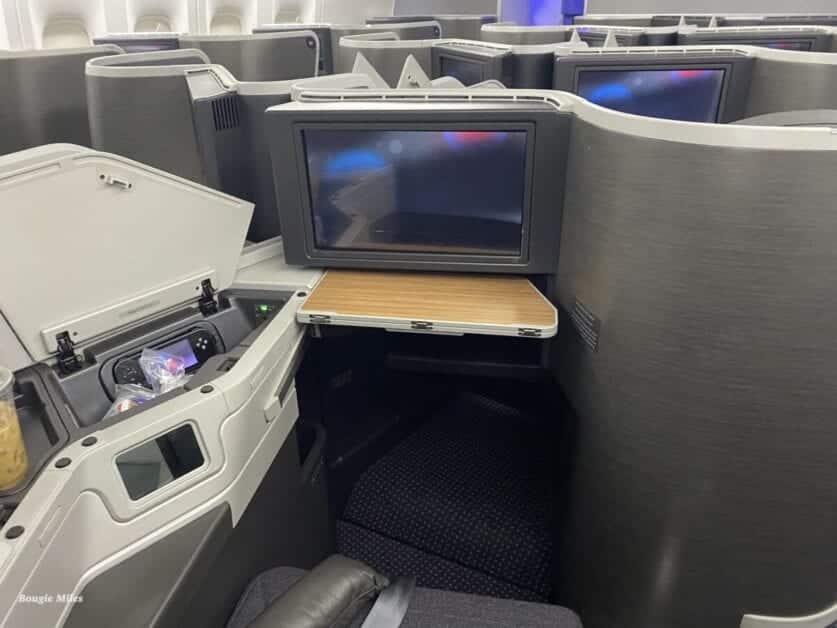 a tv on a table in a plane