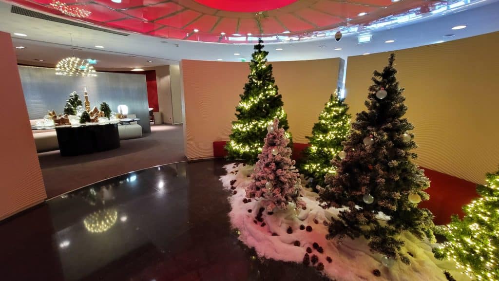 a group of christmas trees in a room