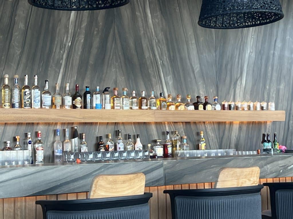 a bar with bottles of alcohol