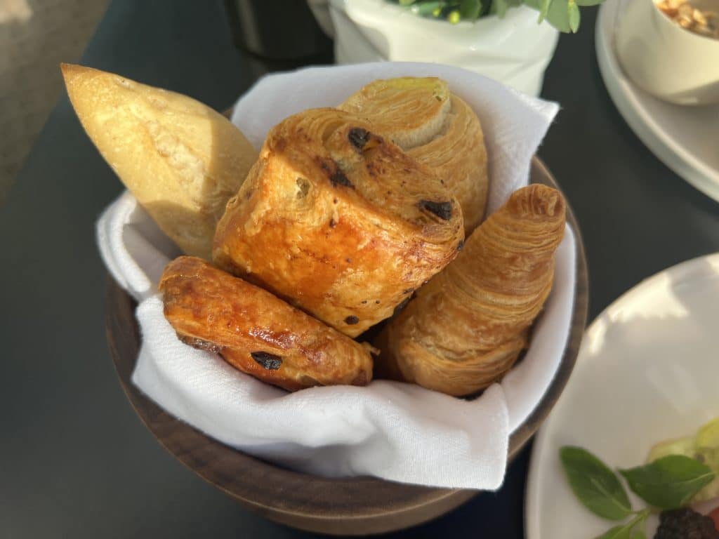 a bowl of bread and rolls