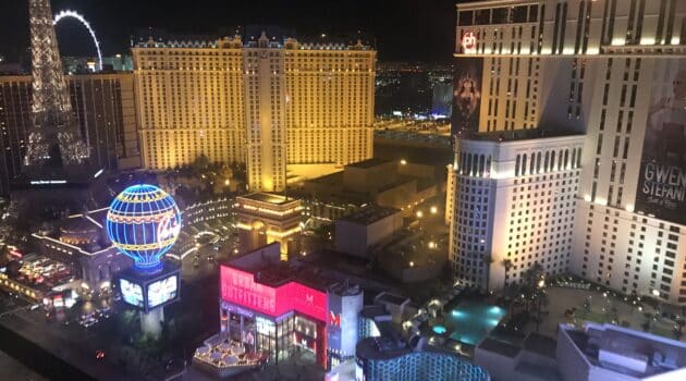 a city at night with many buildings