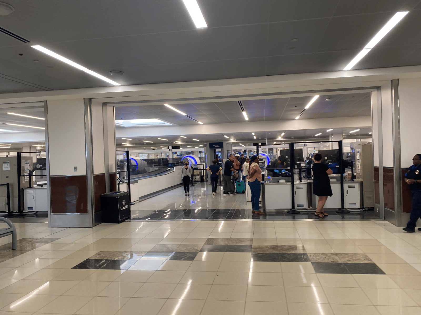 people standing in a line in a building