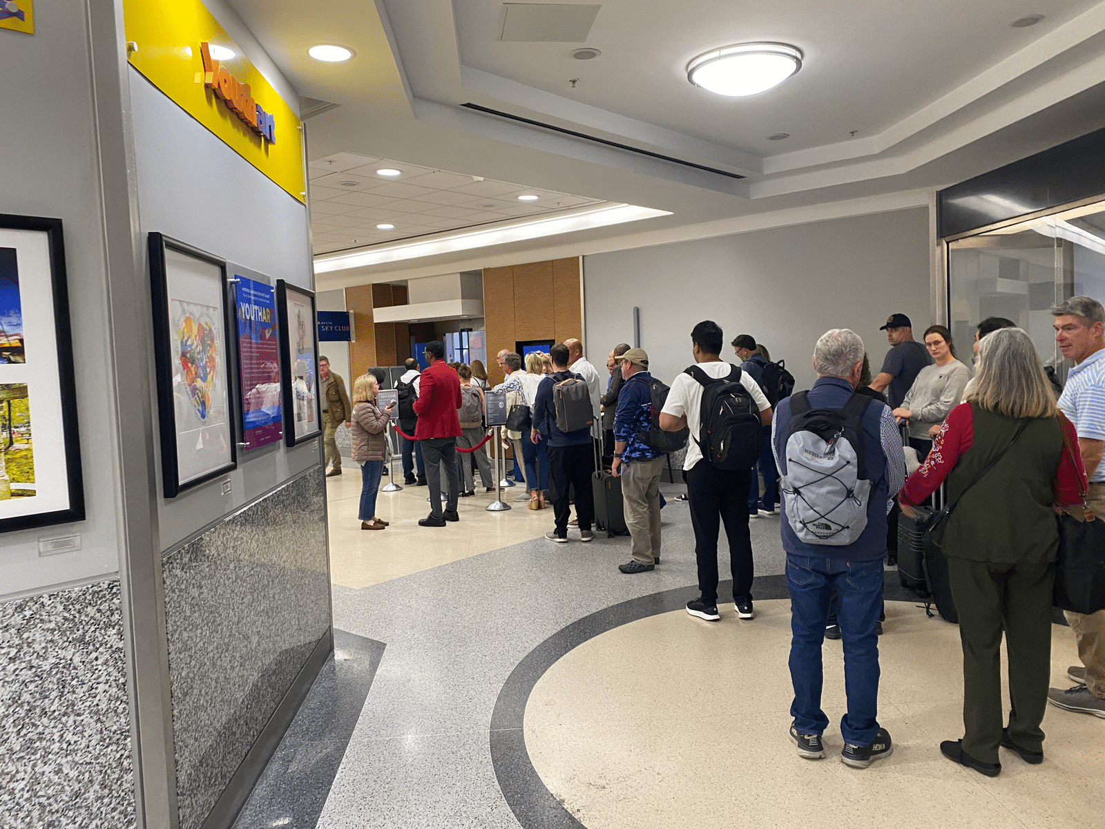 a group of people standing in a line