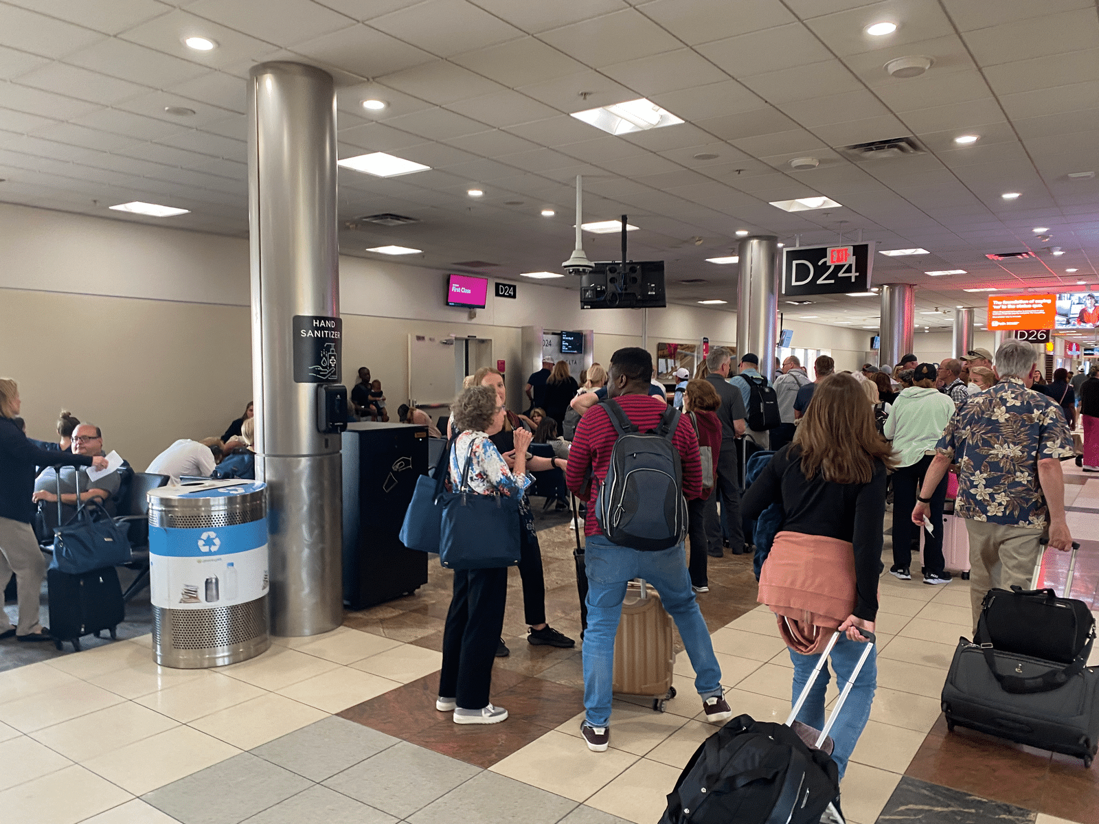 a group of people in a terminal