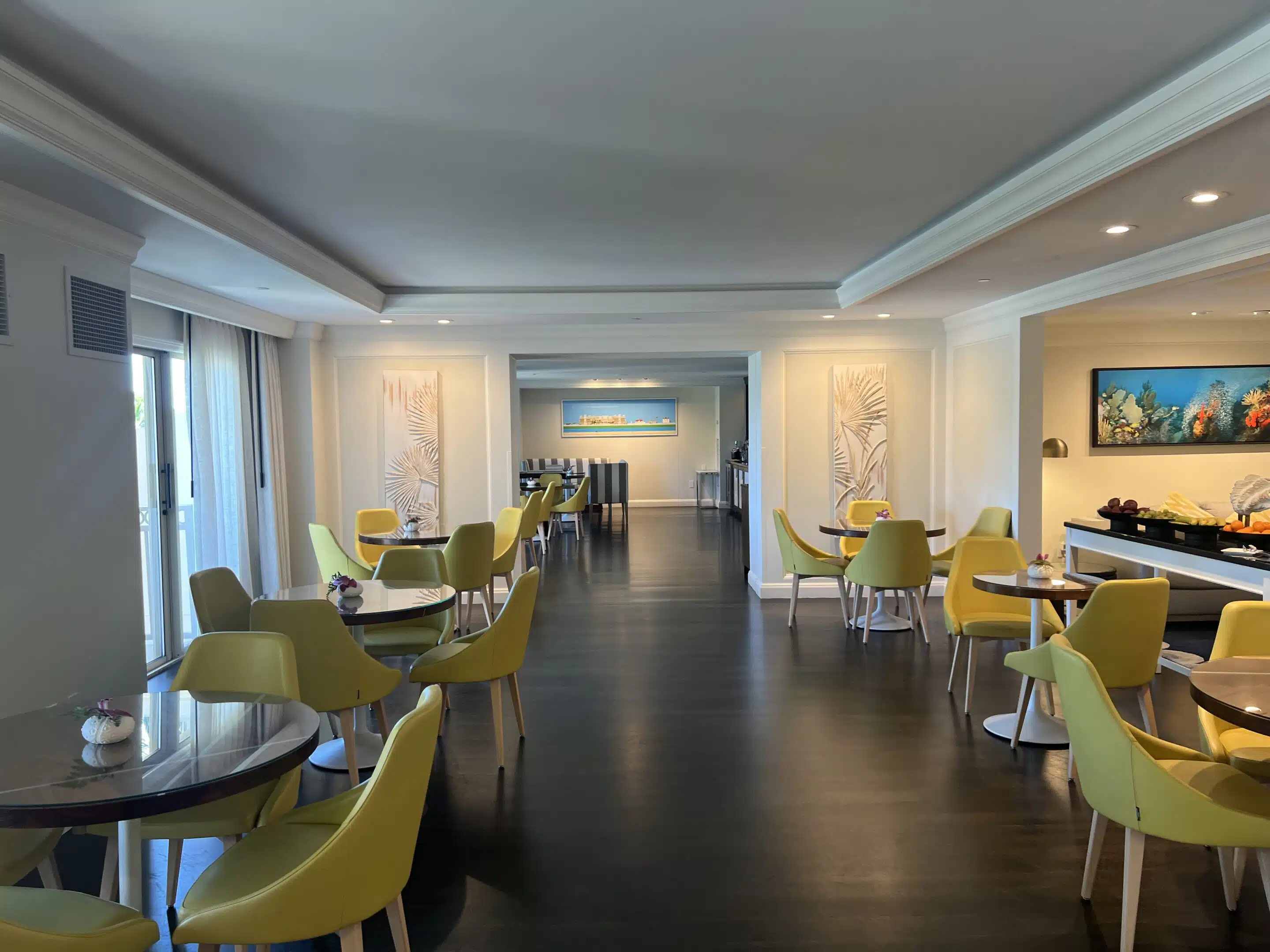 a room with tables and chairs