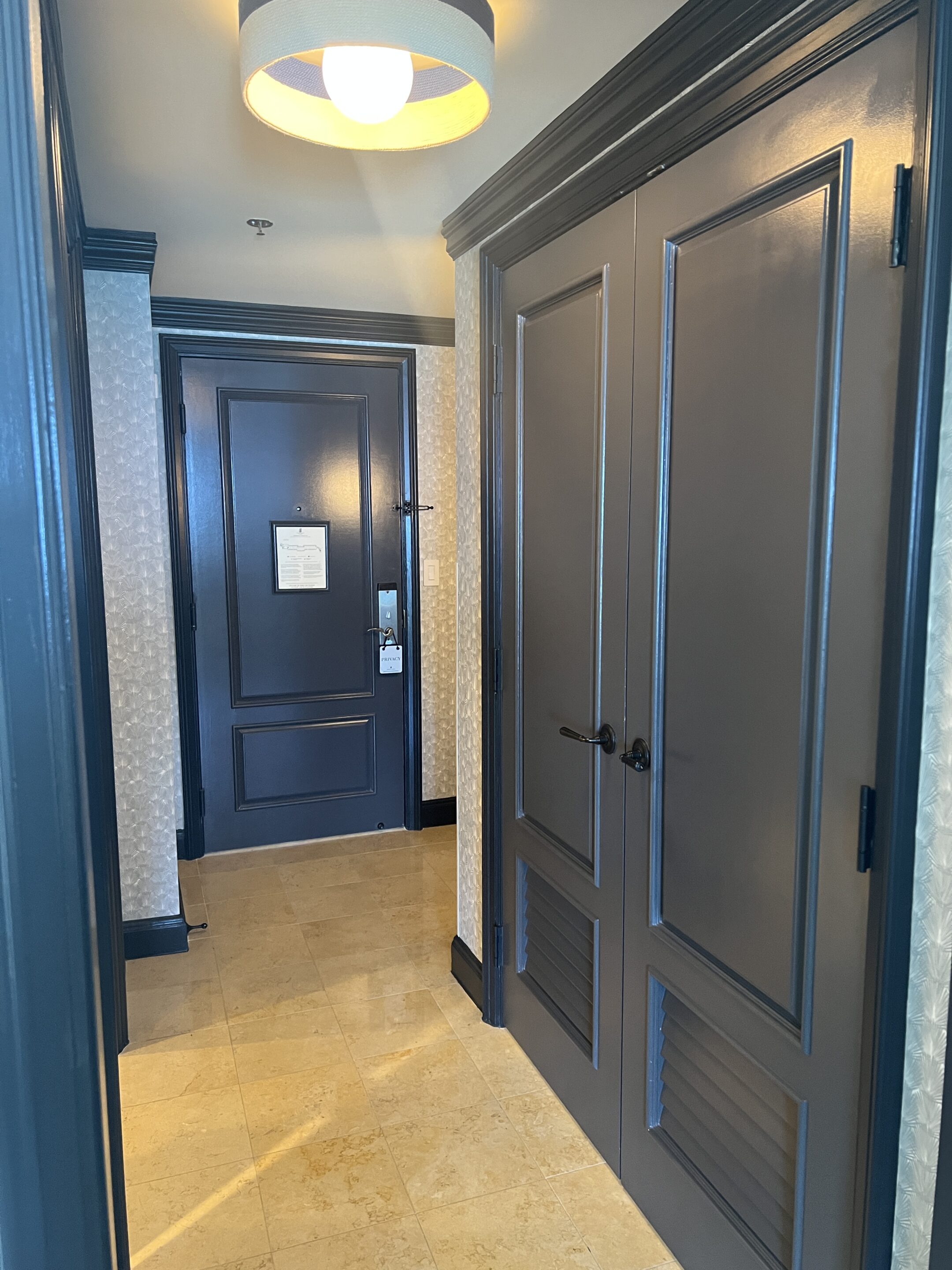 a hallway with two doors