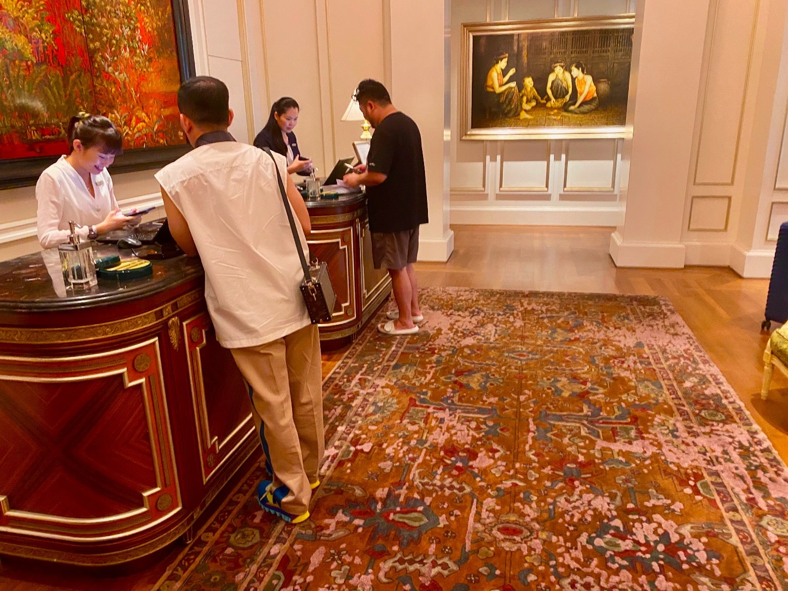 a group of people at a reception desk