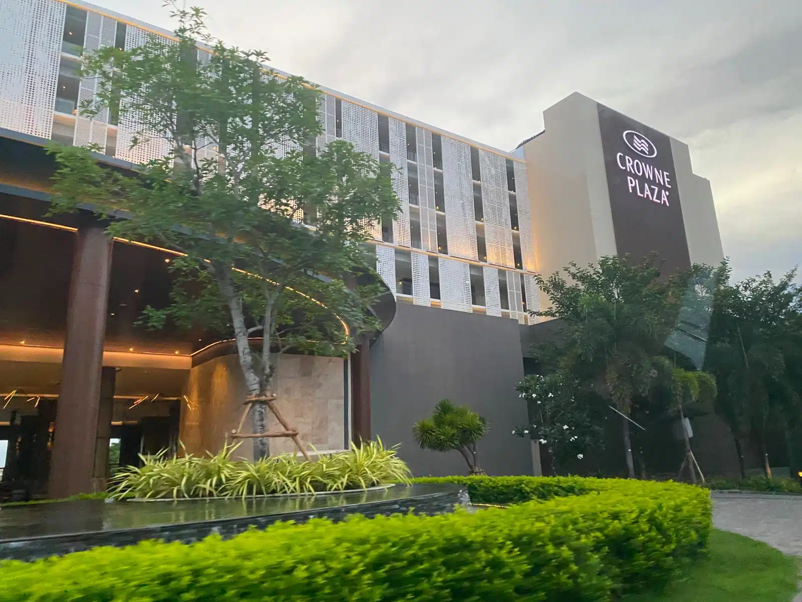 a building with trees and bushes