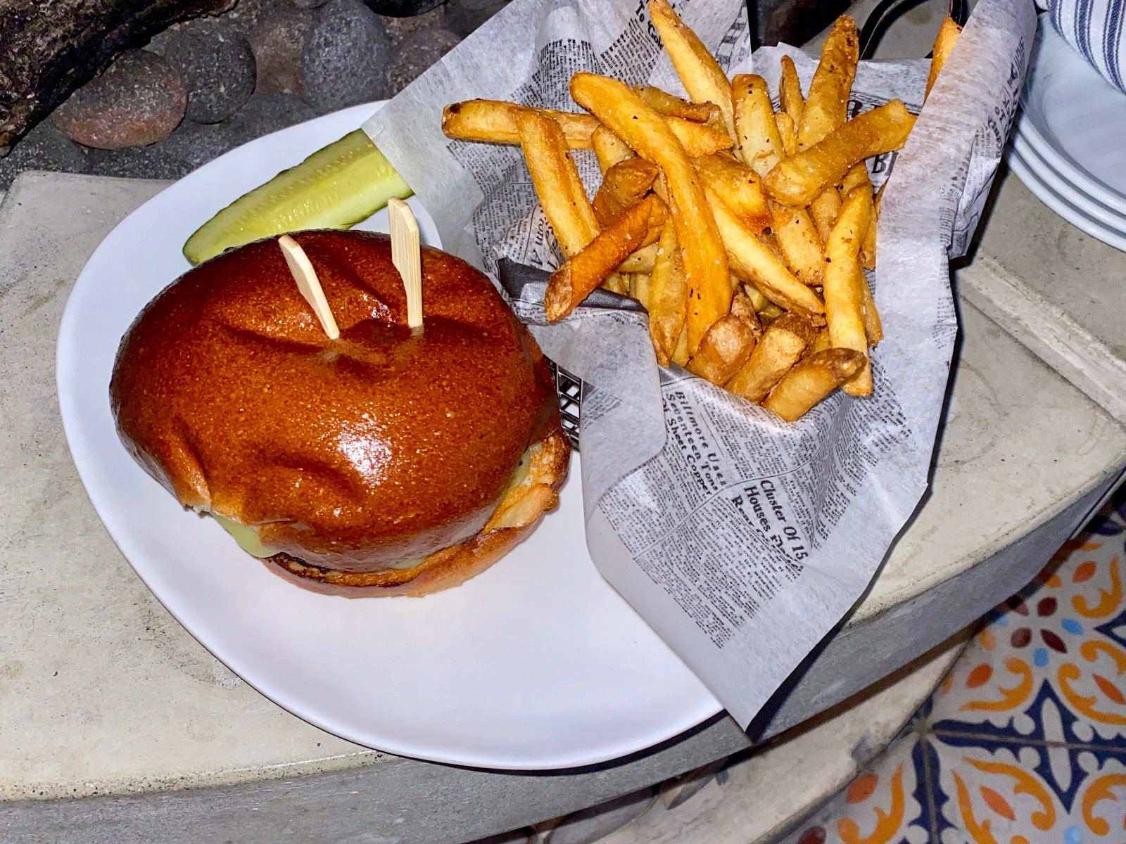 a plate of food with a burger and fries