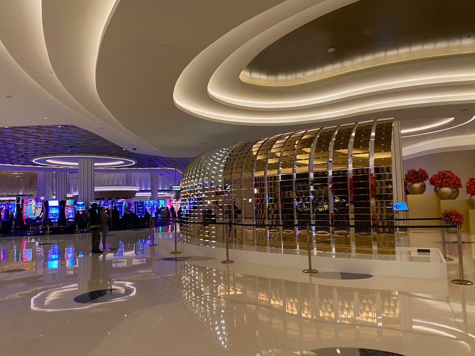 a large room with a large round wall and a large white floor