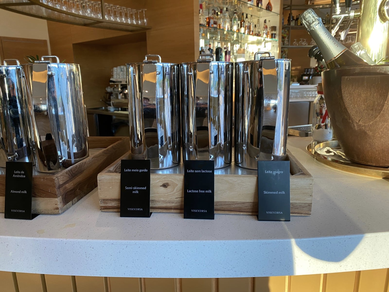 a group of silver containers on a counter