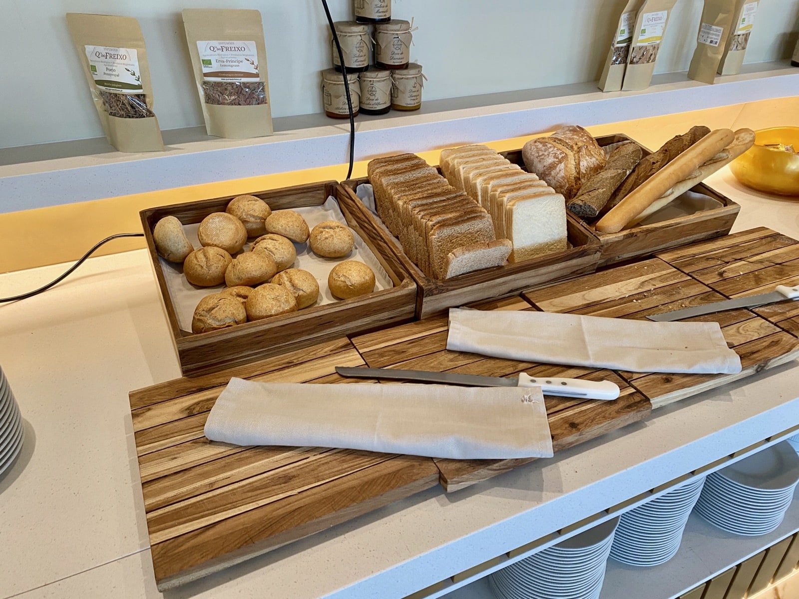 a variety of bread in wooden boxes