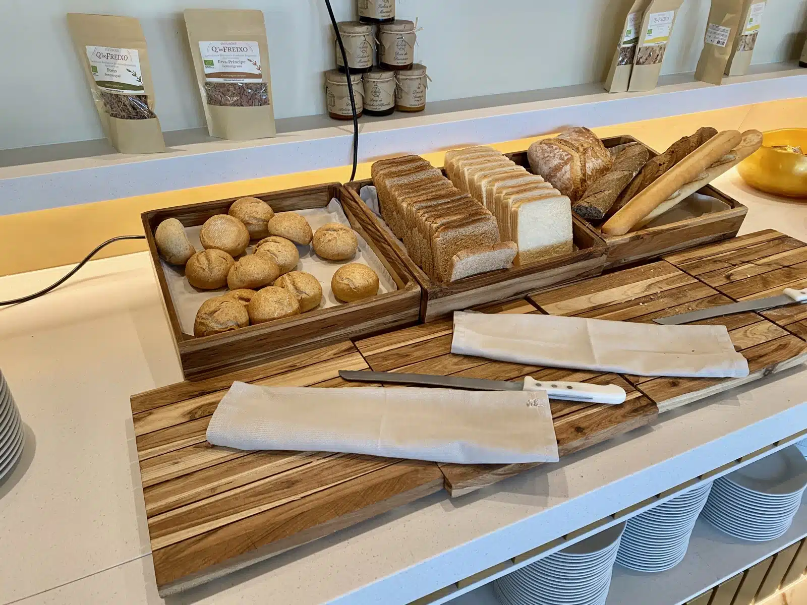 a variety of bread in wooden boxes