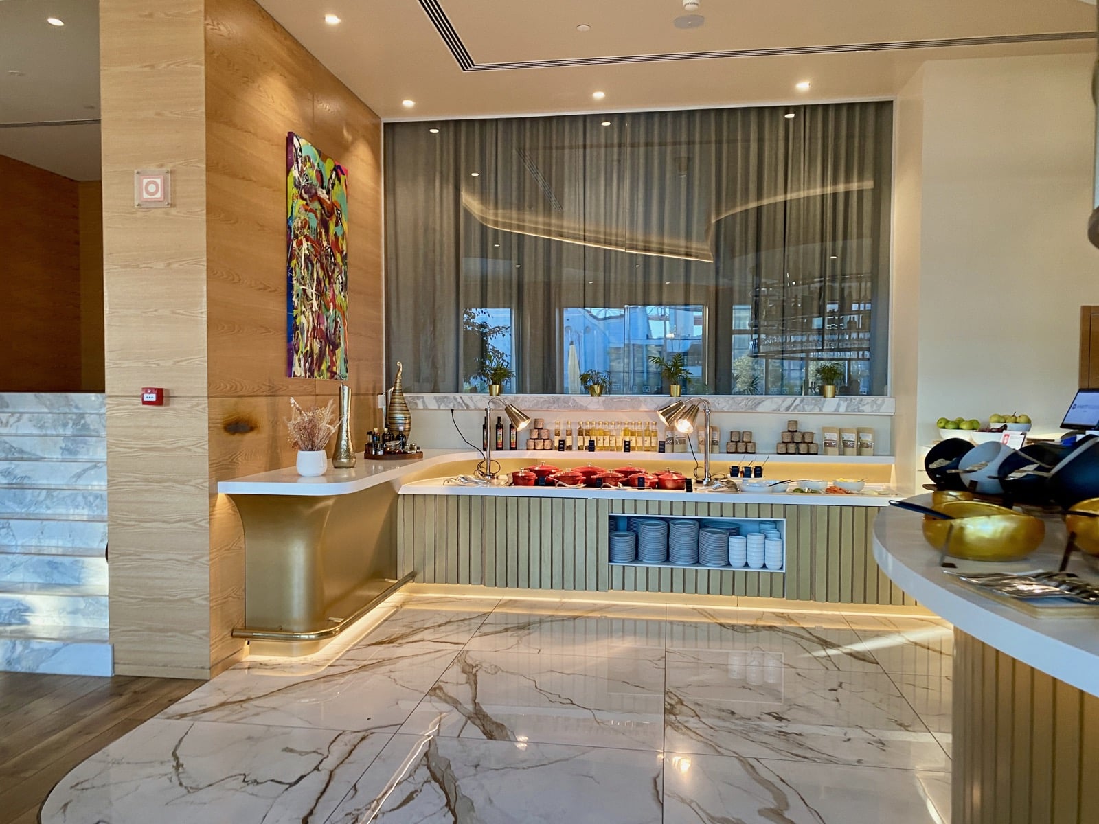 a room with a counter and a large window