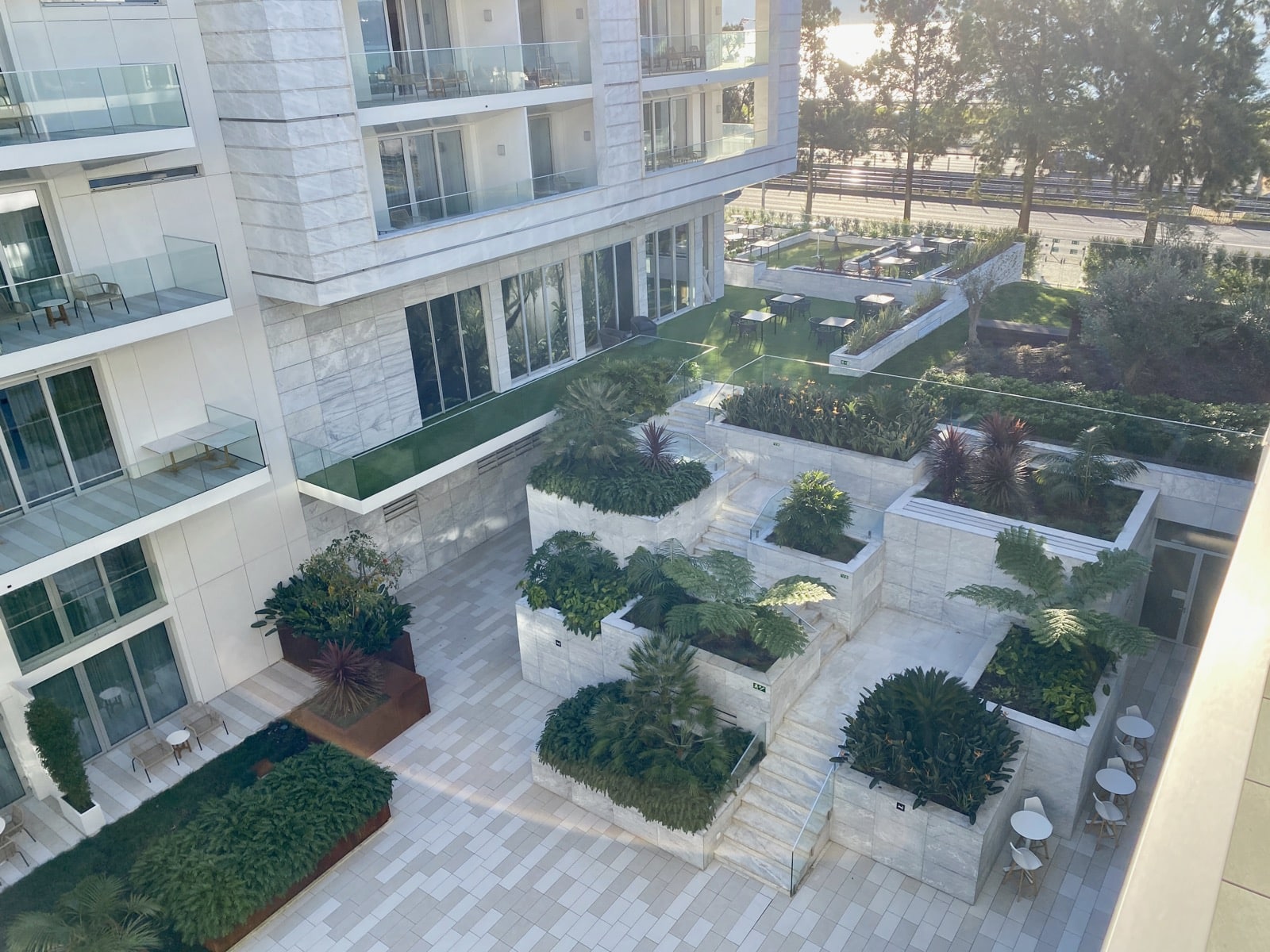 a building with plants and trees