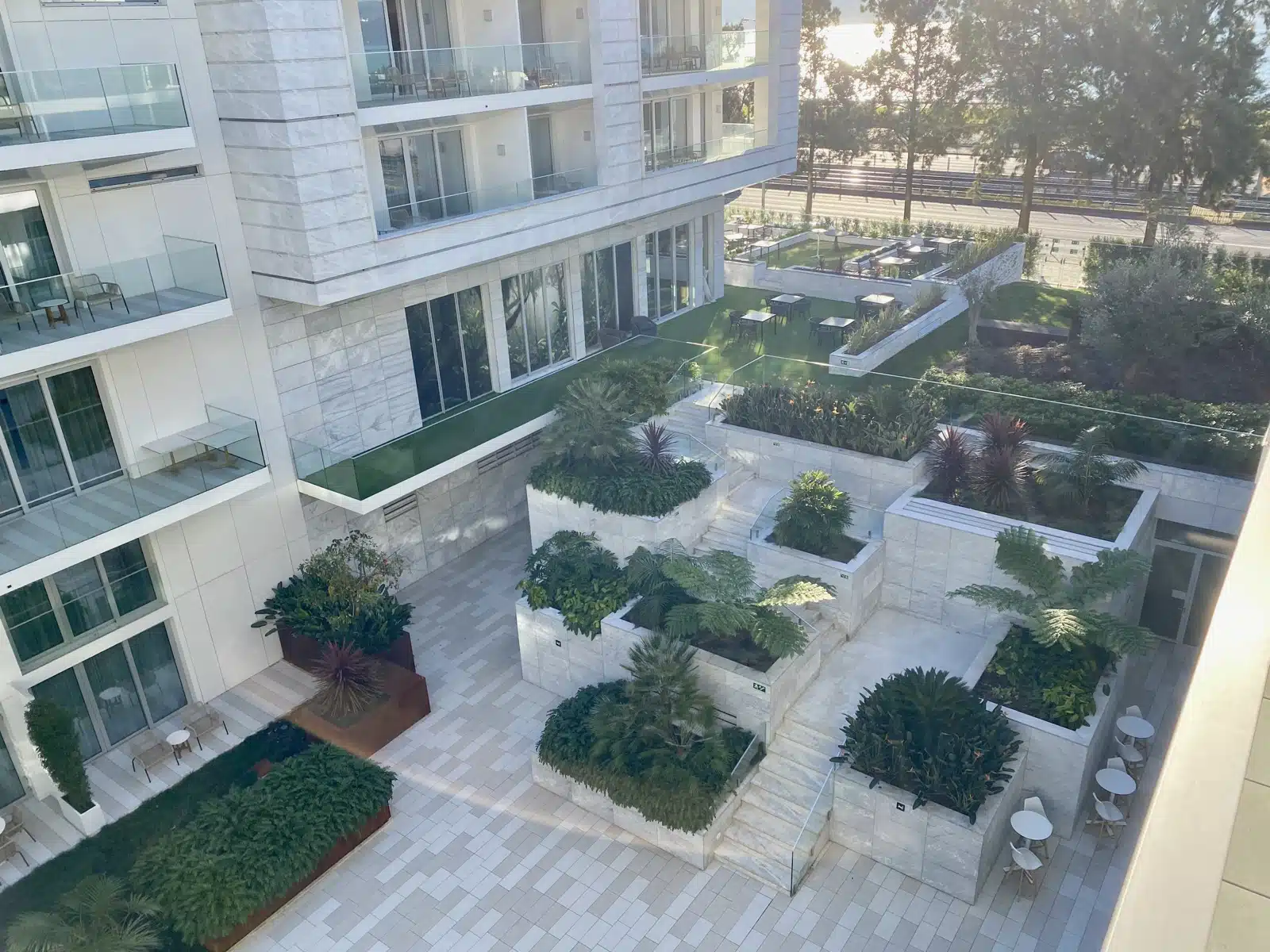 a building with plants and trees