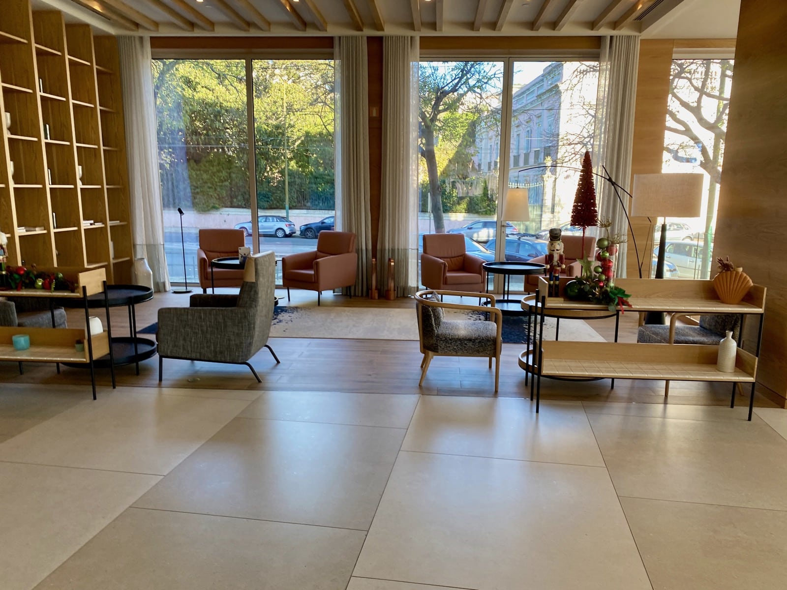 a room with a large window and chairs