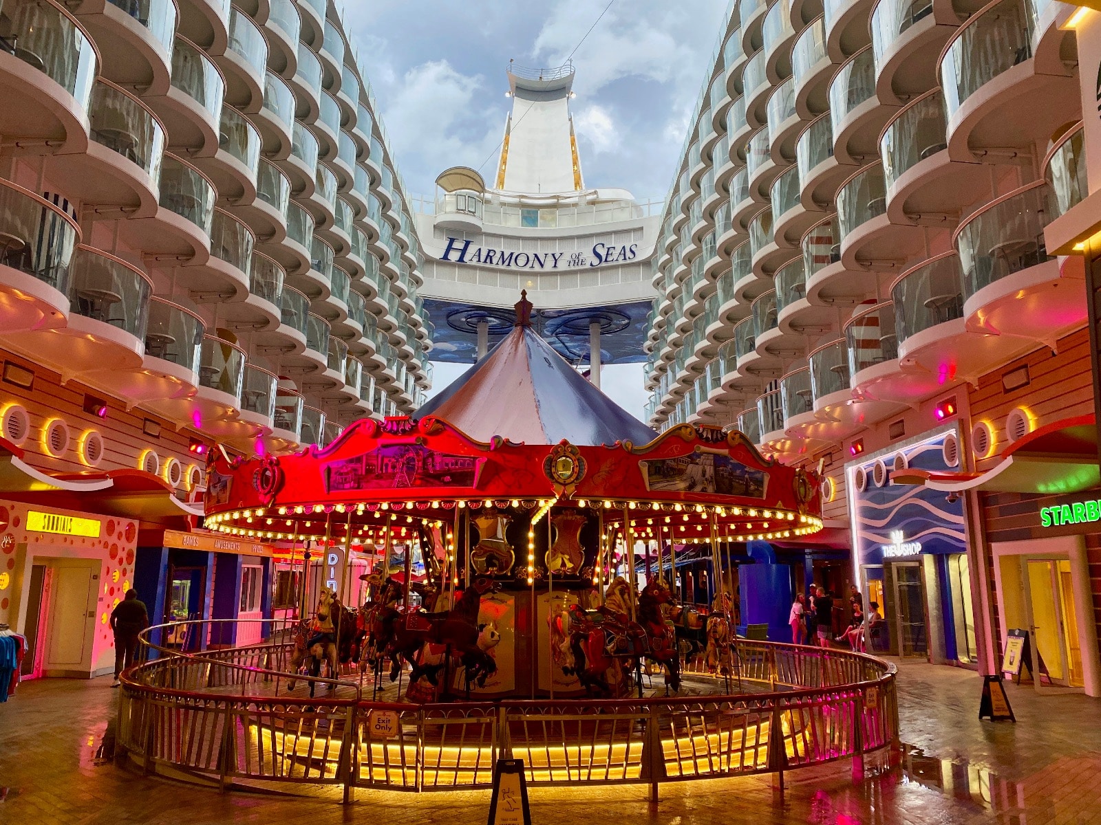 a carousel in a courtyard of a cruise ship