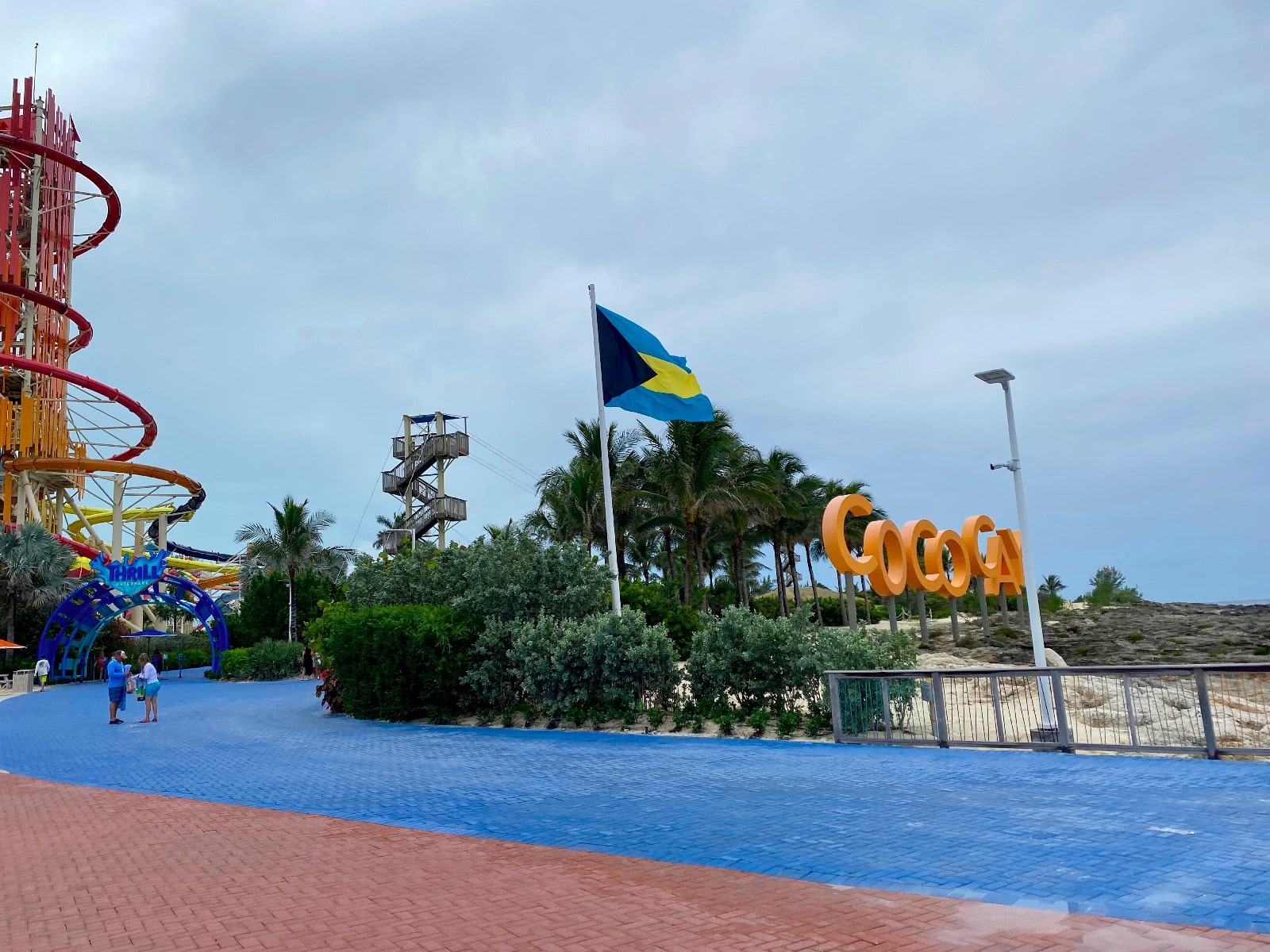 a blue and yellow sign with a blue and yellow flag