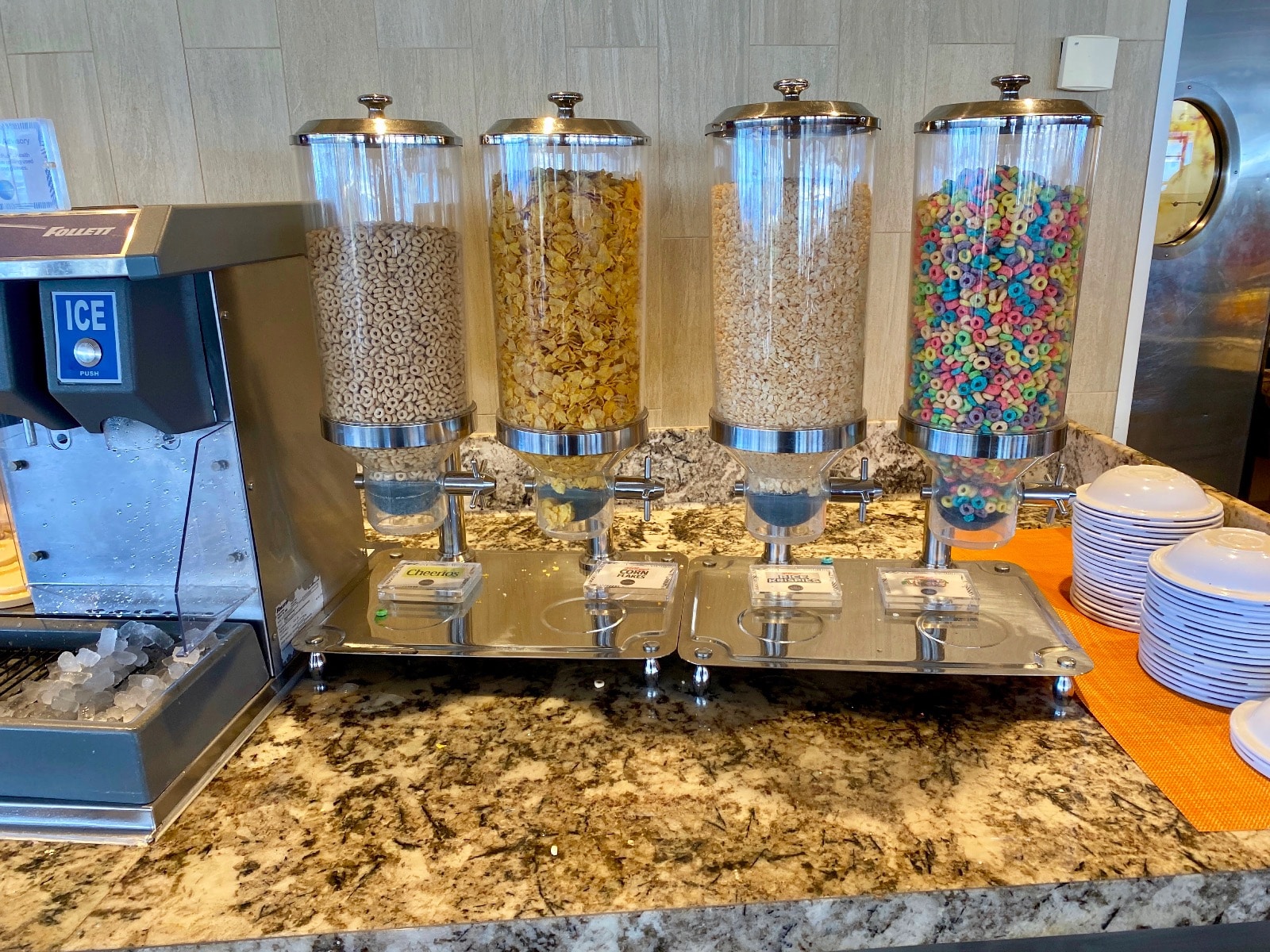 a group of cereals in a dispenser