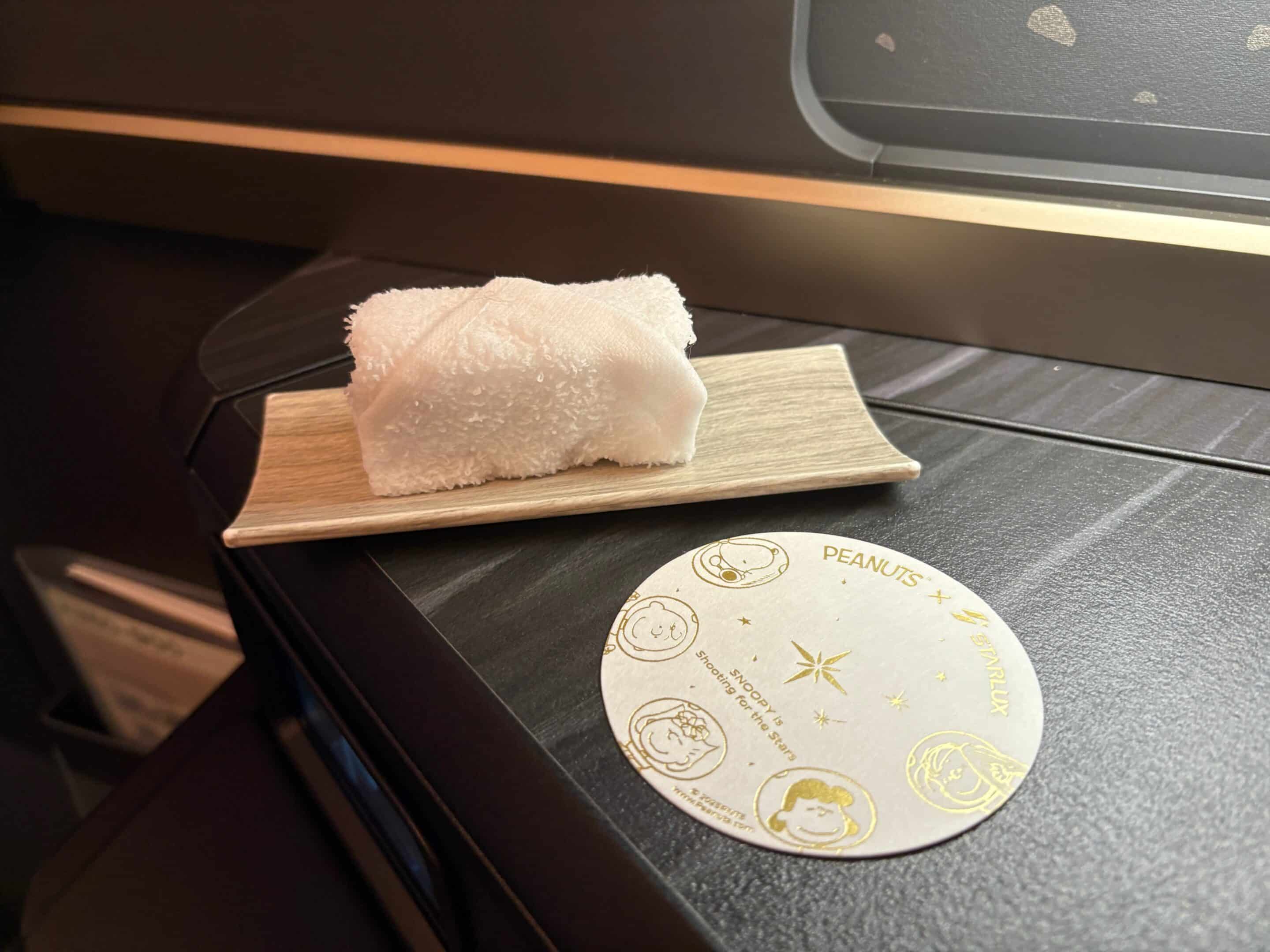 a piece of food on a wooden plate