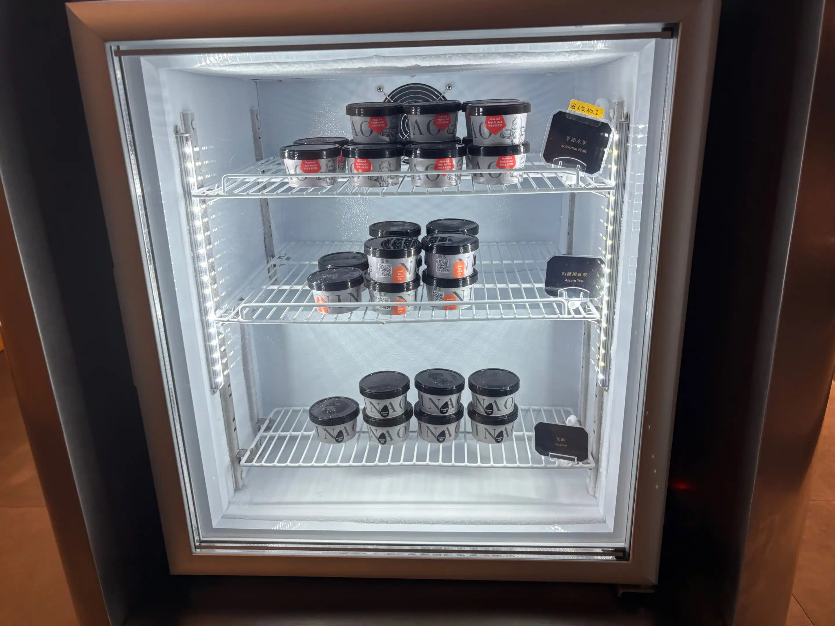 a refrigerator with jars of food on shelves