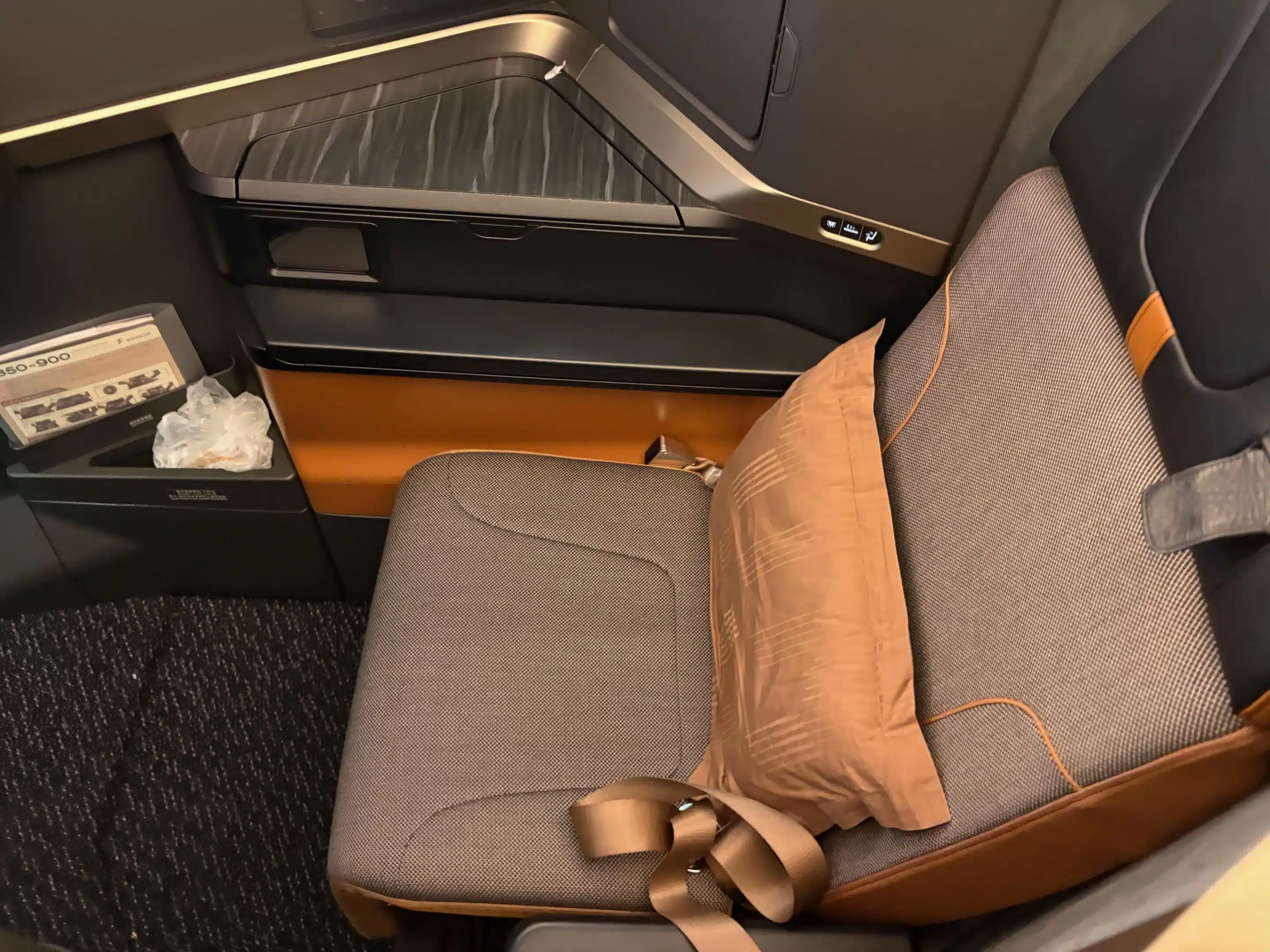 a seat with a pillow on it