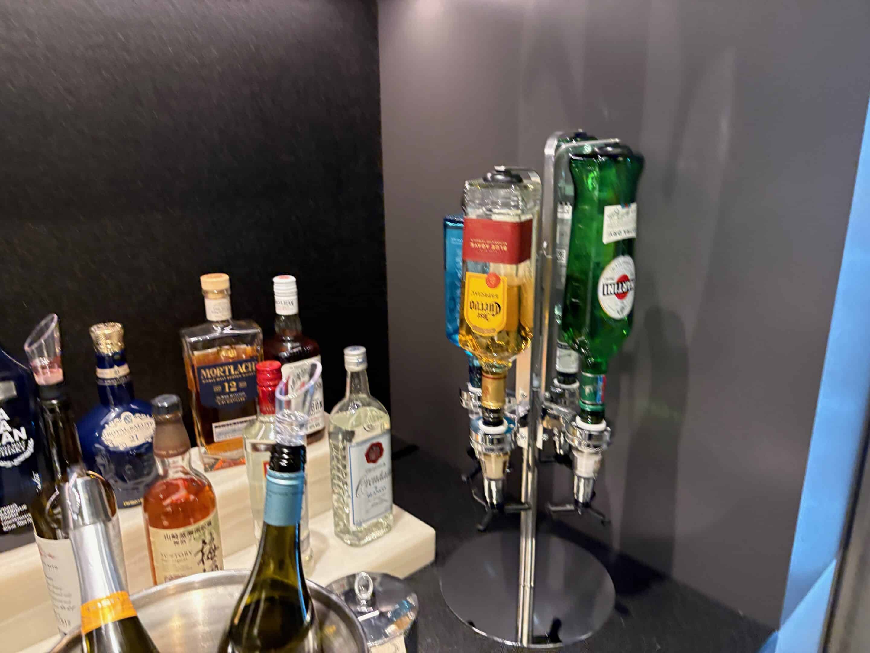 a group of bottles of alcohol on a table