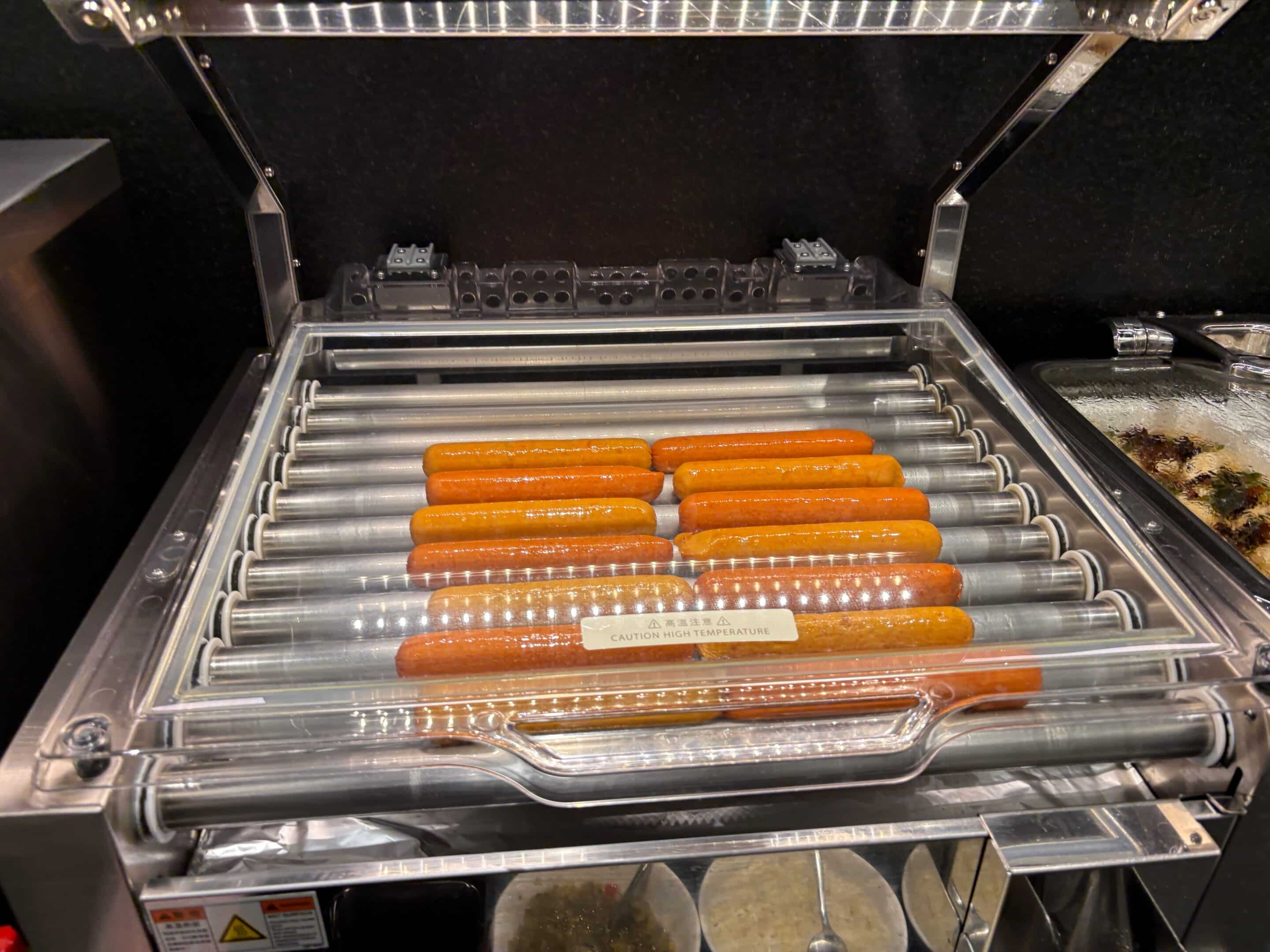 hot dogs in a hot dog grill