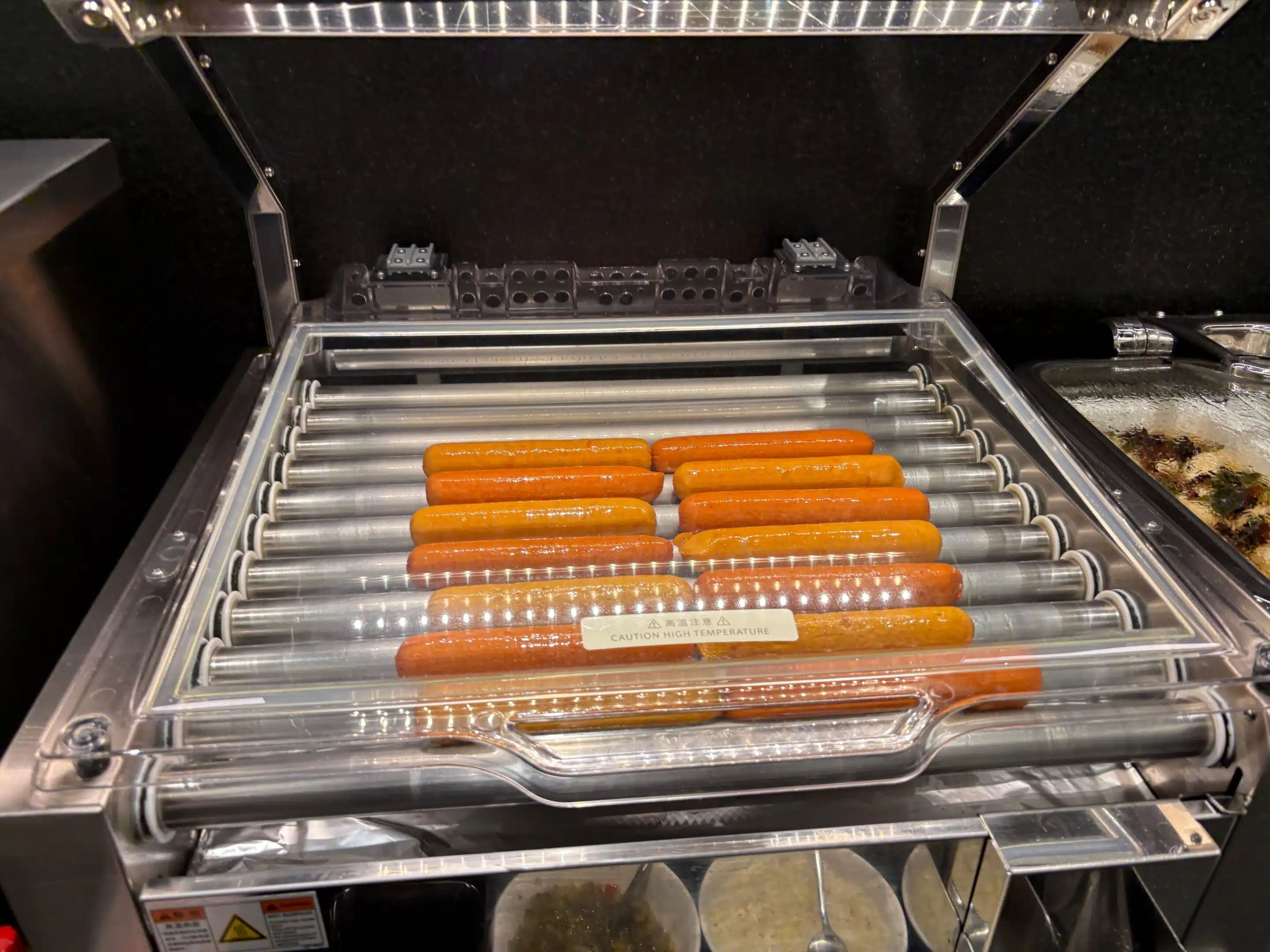 hot dogs in a hot dog grill
