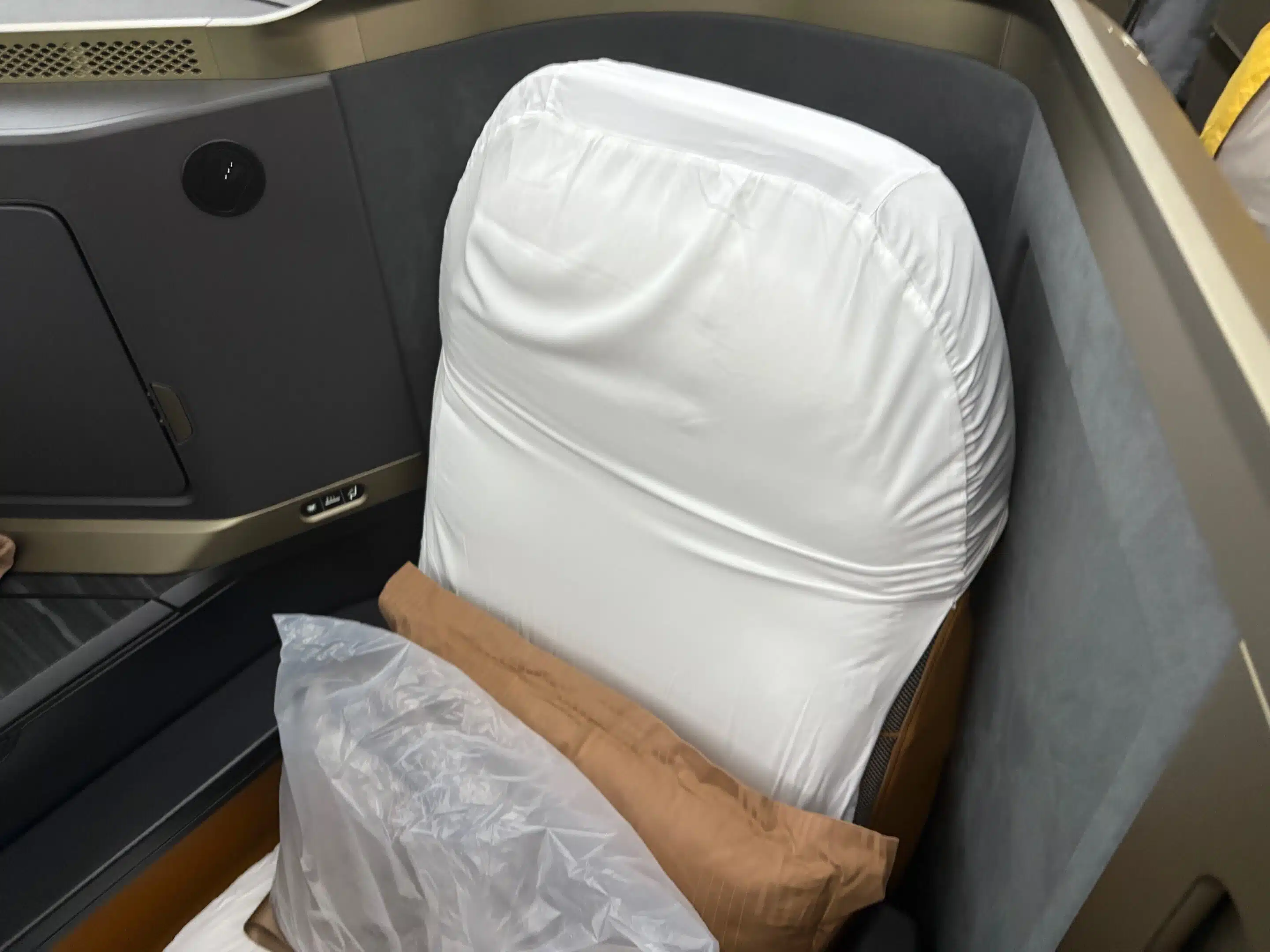 a seat with a white cover